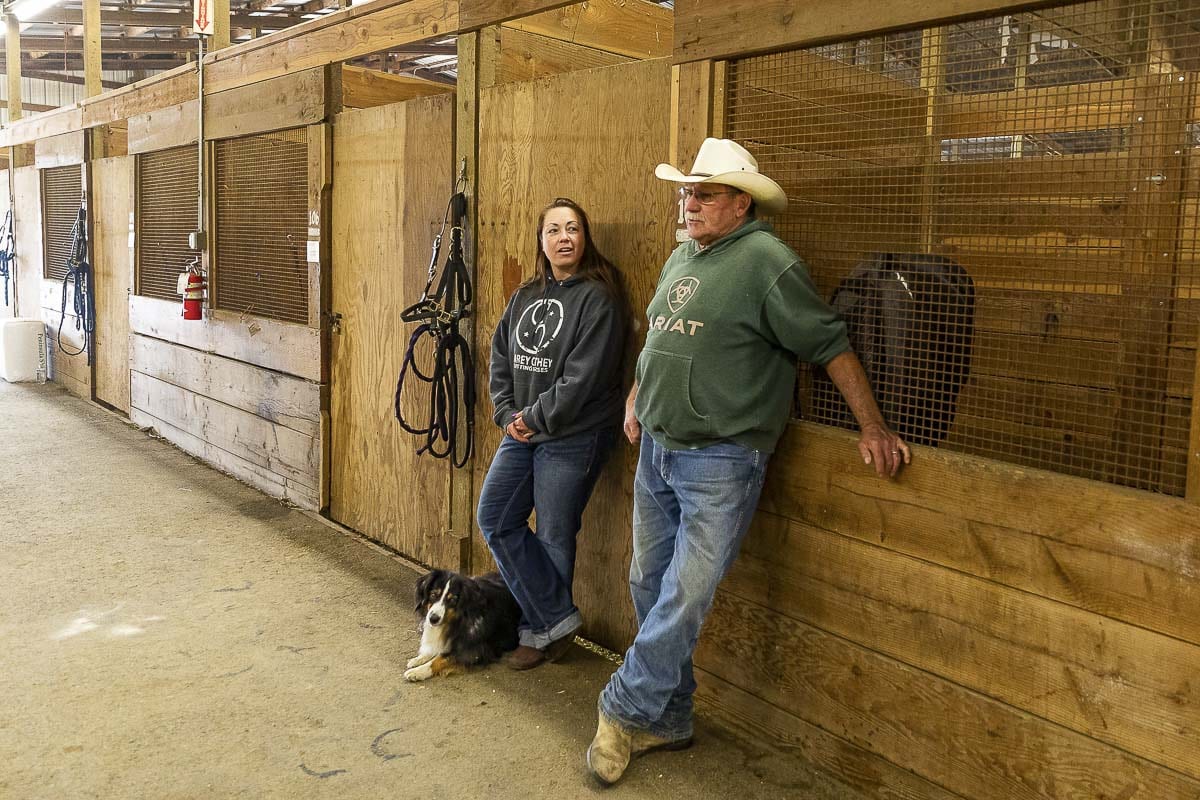 Kati and JR Anderson of Soulmate Ranch in Estacada, Oregon talk about evacuating their horses and finding shelter at Clark County Fairgrounds. Photo by Mike Schultz