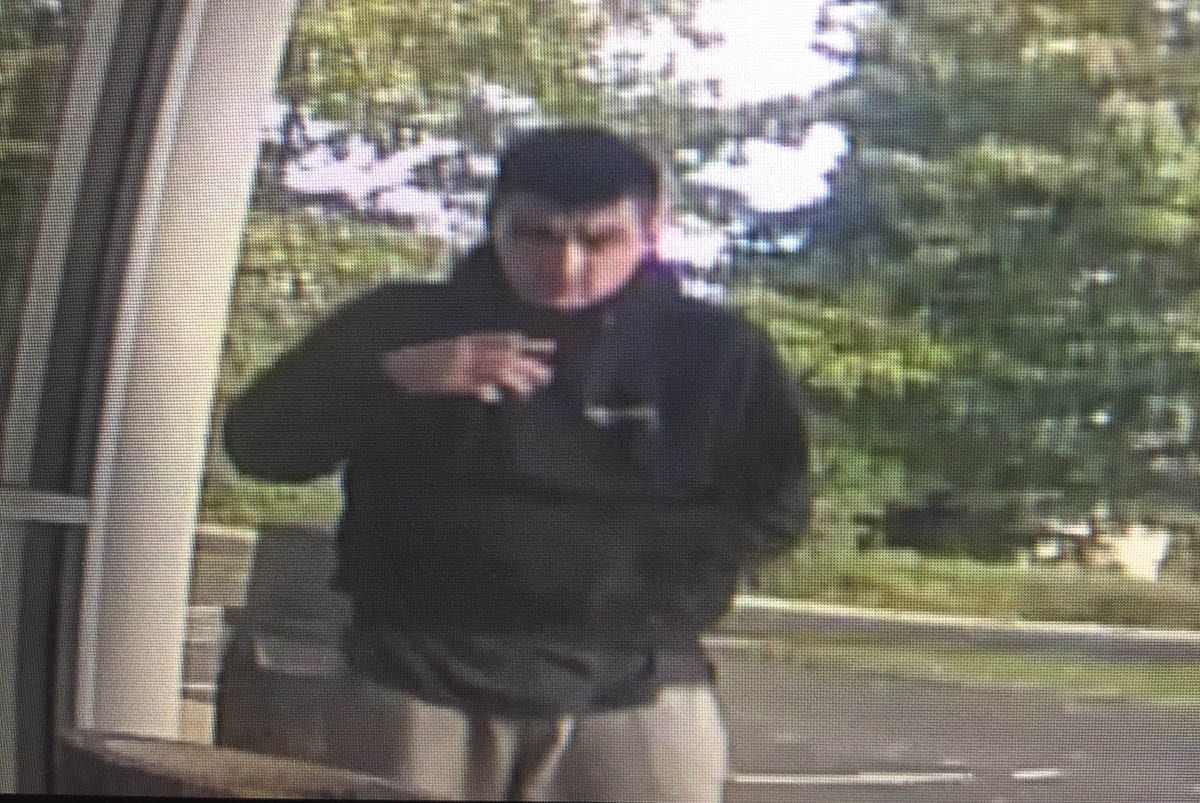 Vancouver Police released this screen capture of security footage at the IQ Credit Union on NE Vancouver Mall Drive on Thursday. The suspect, Anthony Sollers, later turned himself in. Photo courtesy Vancouver Police Department