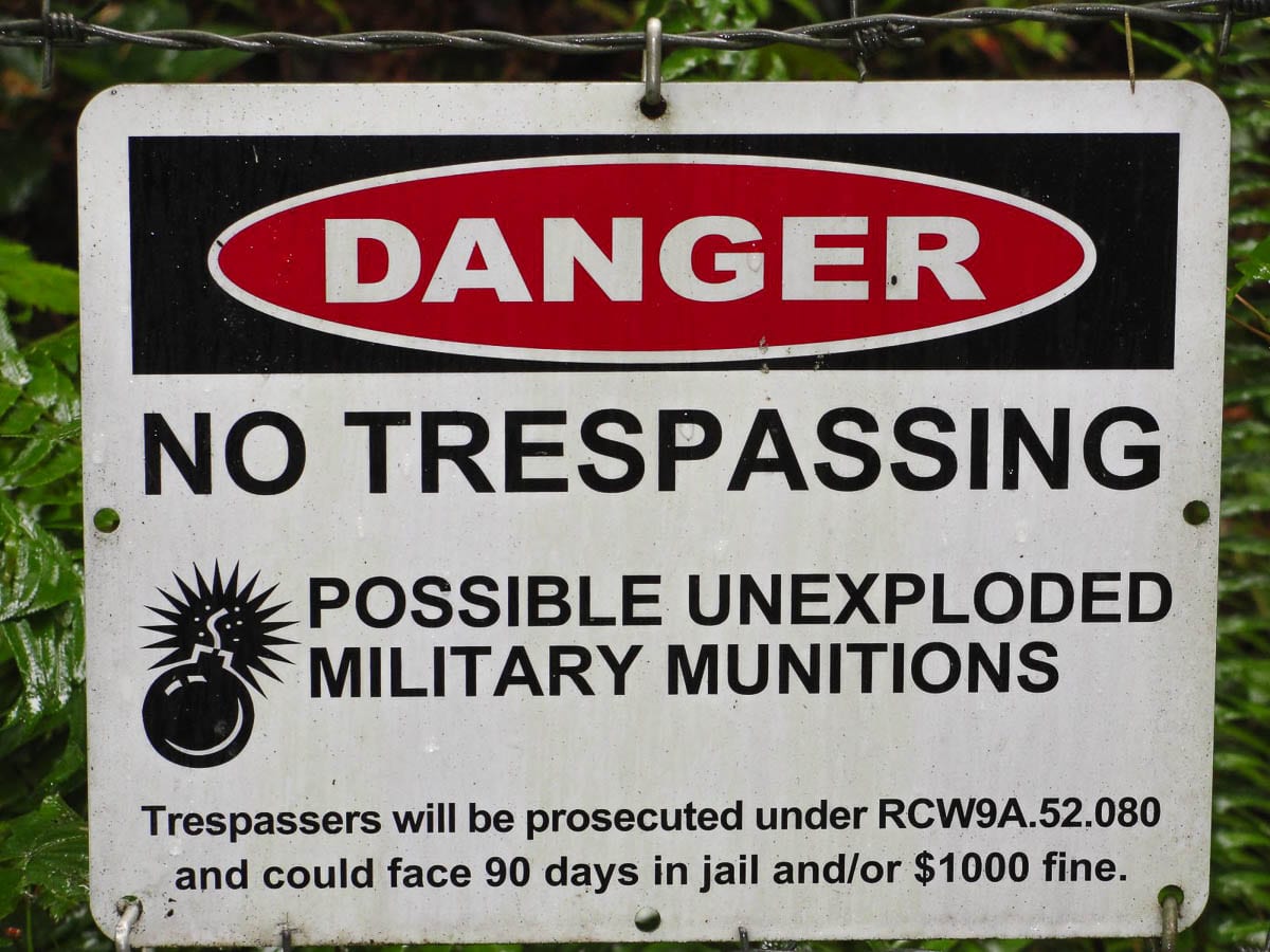 Signs warning people of unexploded ordnance are posted at Camp Bonneville, a former military barracks and training ground. Photo courtesy Clark County Public Works
