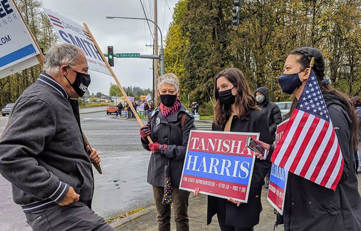 Gov. Jay Inslee joined candidate Tanisha Harris at a sign-waiving event on Saturday. Photo courtesy of Tanisha Harris Facebook