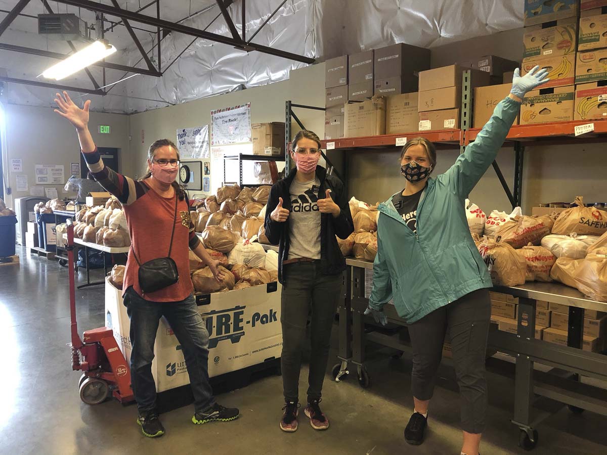 Volunteers wear PPEs while sorting food and serving hot meals as part of Share’s response to the COVID-19 crisis. During the month of October, Share is holding it’s annual Seats & Feets drive. Photo courtesy of Share Vancouver