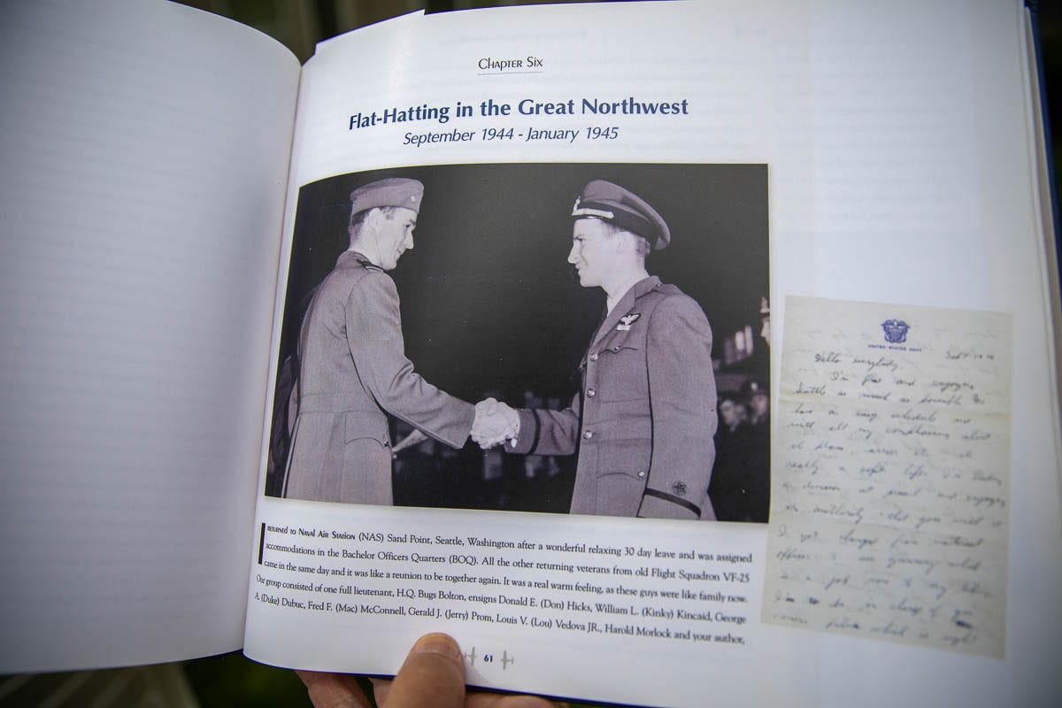 Edgar W. Haley’s self-published memoir on his experiences during World War II contains many photos and memories of the men he served with in the U.S. Navy. Photo by Jacob Granneman
