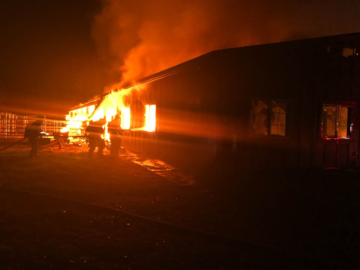Initial reports stated the structure was heavily involved in fire with propane tanks inside the structure randomly exploding. Photo courtesy of Clark County Fire & Rescue