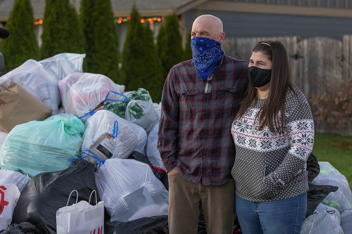 Josh and Nadine McCrow were stunned by how many blankets were donated Sunday at their home in Vancouver. The McCrows donate to Doernbecher Children’s Hospital every year in memory of their daughter Hailey. Photo by Mike Schultz