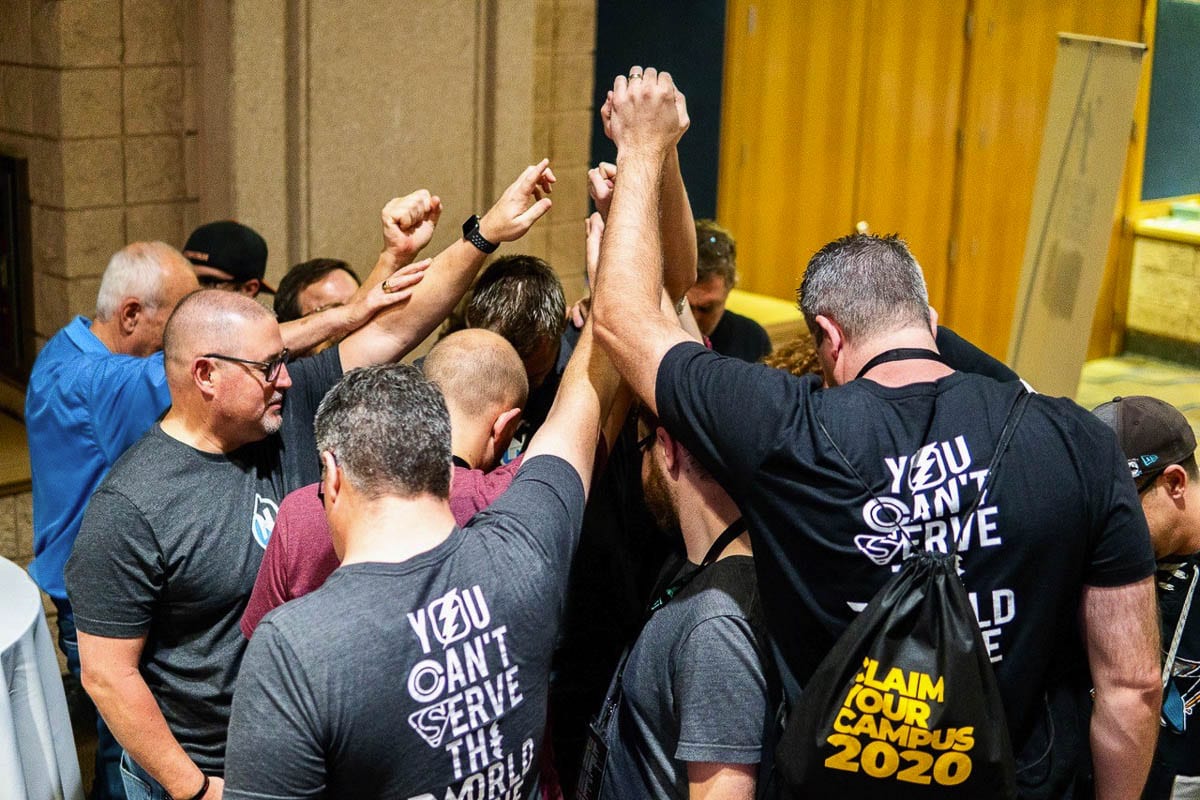 Part of the NNYM Team is seen here in a prayer huddle after over 400 conversations with youth workers in Tampa, FLA over three days. Photo courtesy of Philip Ball