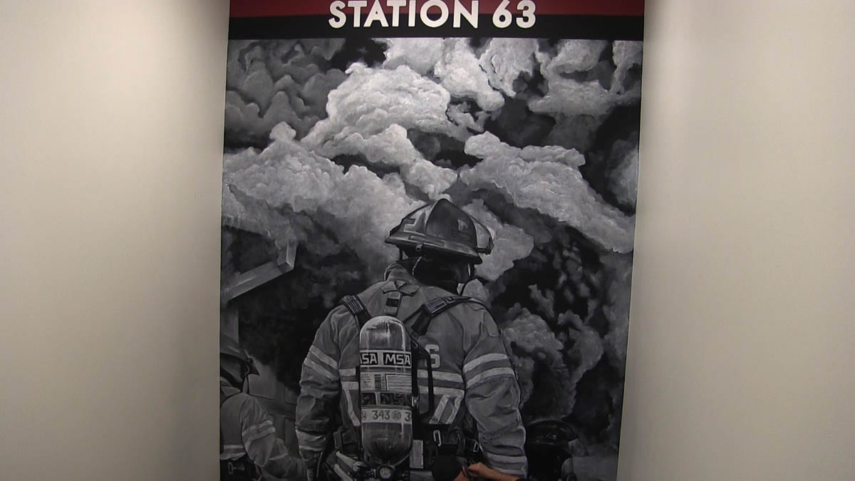 The mural was adopted from an actual photo of District 6 firefighters responding to a call. Those in the painting still work at the station. Photo courtesy of Fire District 6