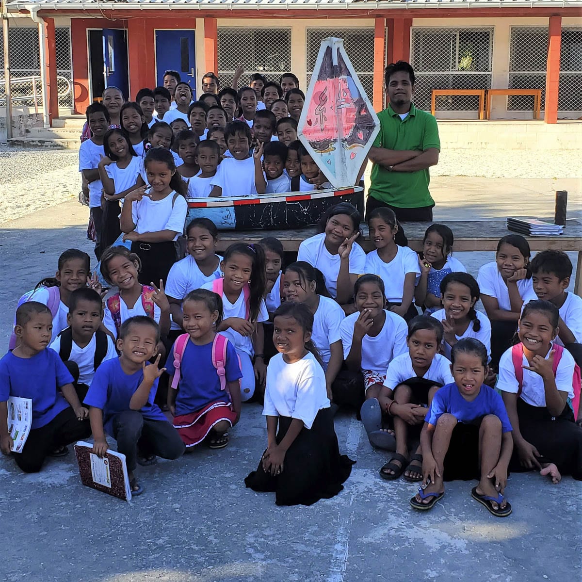 The school children who located the mini boat in Ailuk are seen here with the S/V Liberty. Photo courtesy of CRMM