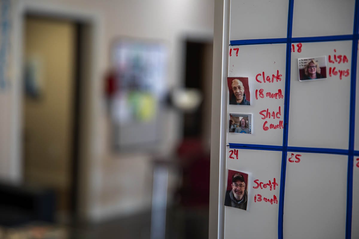 Each month, a board in the café displays the names of members whose “birthday” it is. At the café this is the starting day of your recovery. Photo by Jacob Granneman
