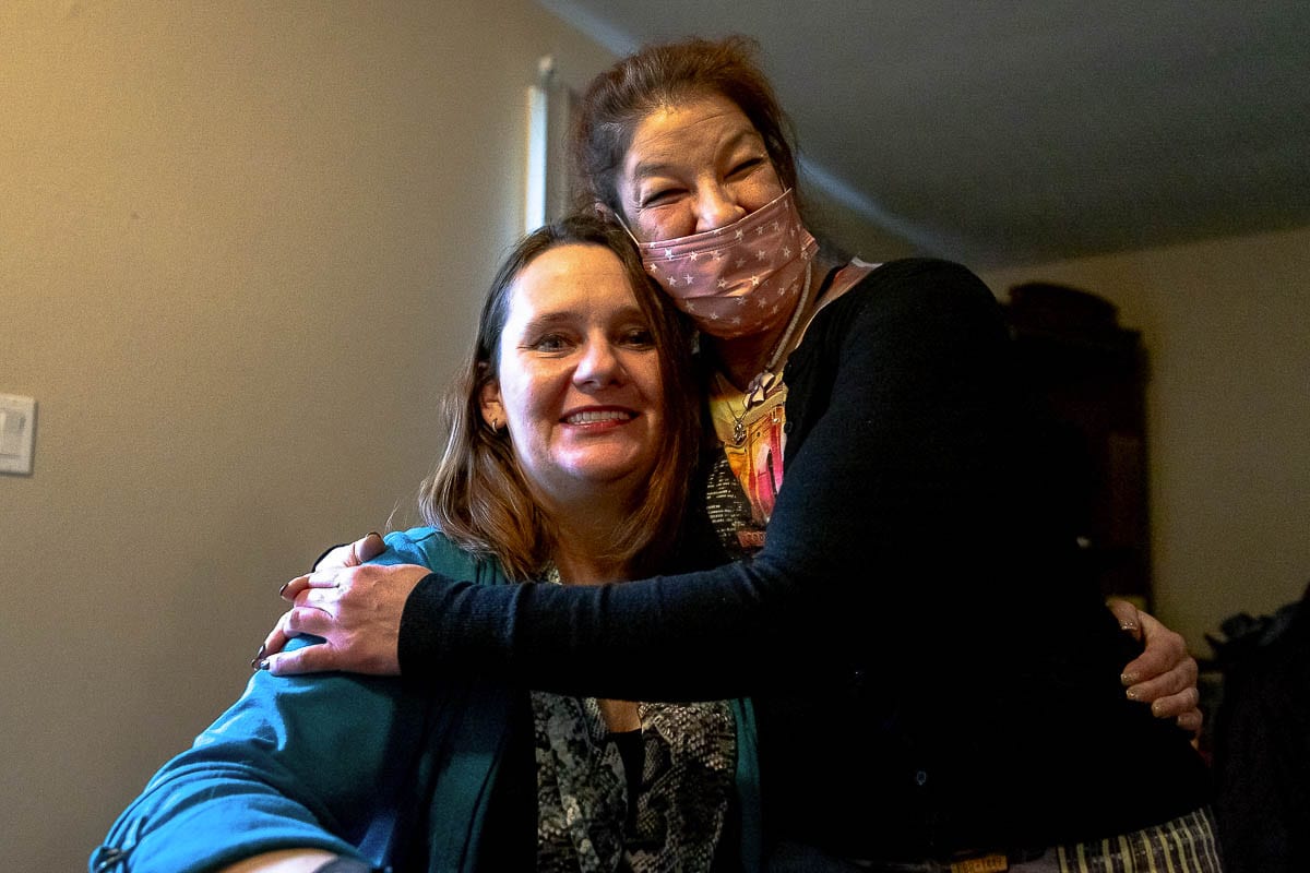Tessa Skilton, left, and her friend Alicia Stanard are thrilled that Skilton has her own apartment. Skilton spent 10 years on the streets, homeless. Photo by Mike Schultz