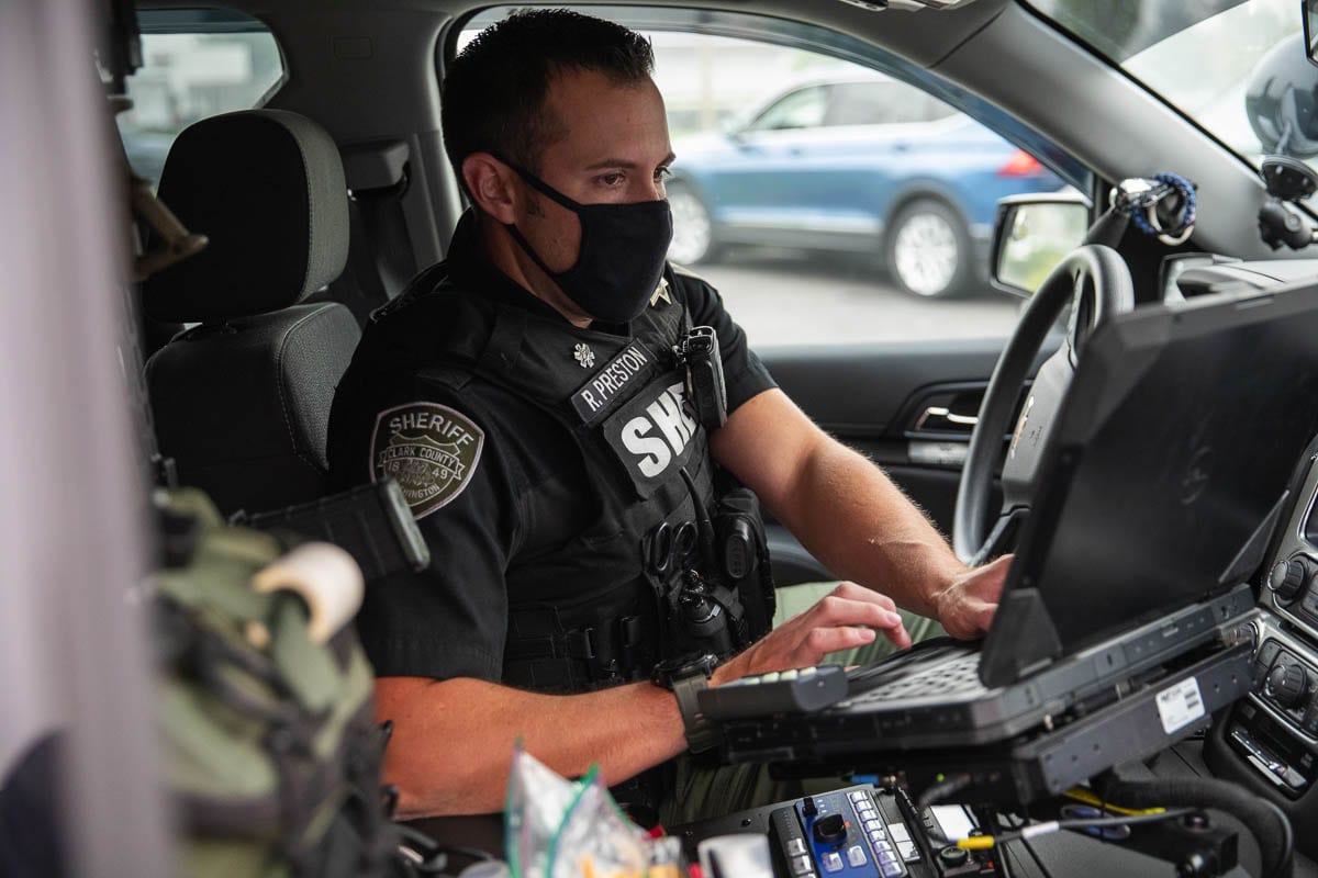 CCSO Deputy Ryan Preston, is seen here processing a ticket after a traffic stop for a different Target Zero funded emphasis patrol on distracted driving. Photo by Jacob Granneman