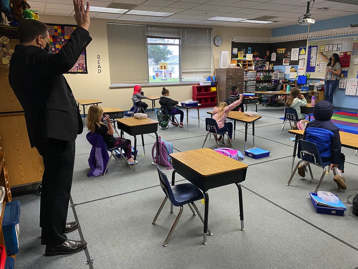 Superintendent Mark Ross visits 2nd grade teacher Katherine Simko’s class at Maple Grove Primary School. Battle Ground’s K-4 students started hybrid learning this week, with students in grades 5-8 slated to return Feb. 22. Photo courtesy of Battle Ground School District