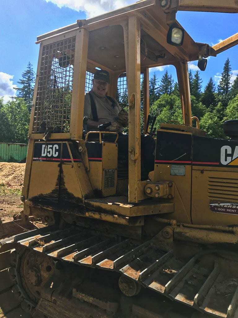 Ralph Huffman could always be seen on a bulldozer, making fixes to the Washougal MX Park. Huffman, 83, the co-owner of the track, died Monday. Photo courtesy of the Huffman family