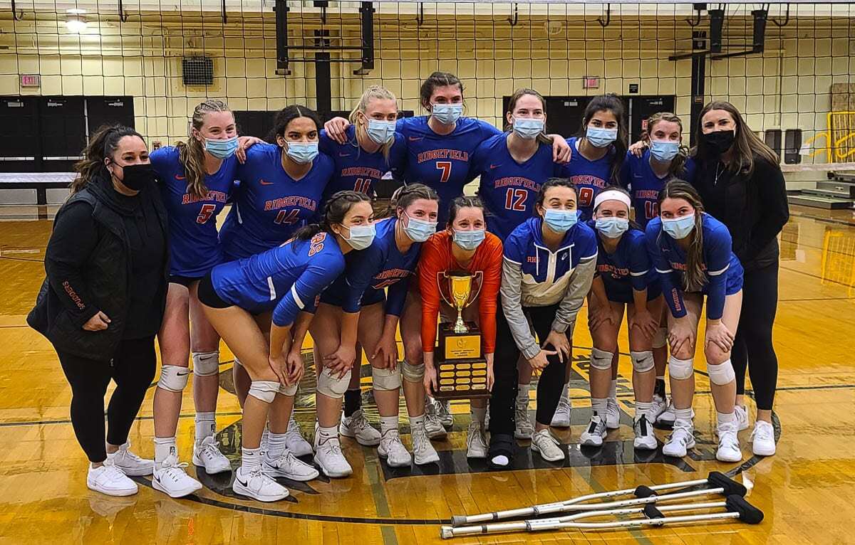 The Ridgefield Spudders completed an undefeated season by topping Woodland in the Class 2A District 4 volleyball championship Saturday at Hudson’s Bay High School. Photo by Paul Valencia