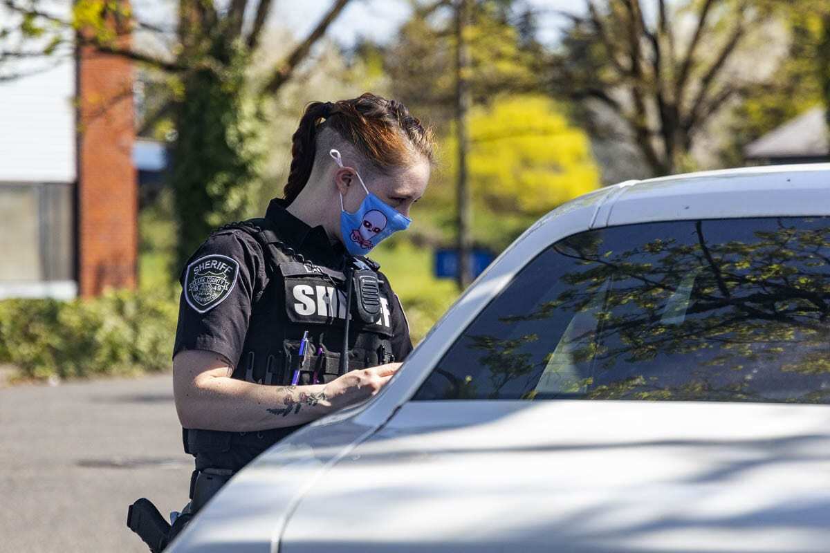 CCSO Traffic Detective, Bethany Lau conducts a traffic stop for distracted driving during a Target Zero enforcement along Mill Plain. Photo by Jacob Granneman