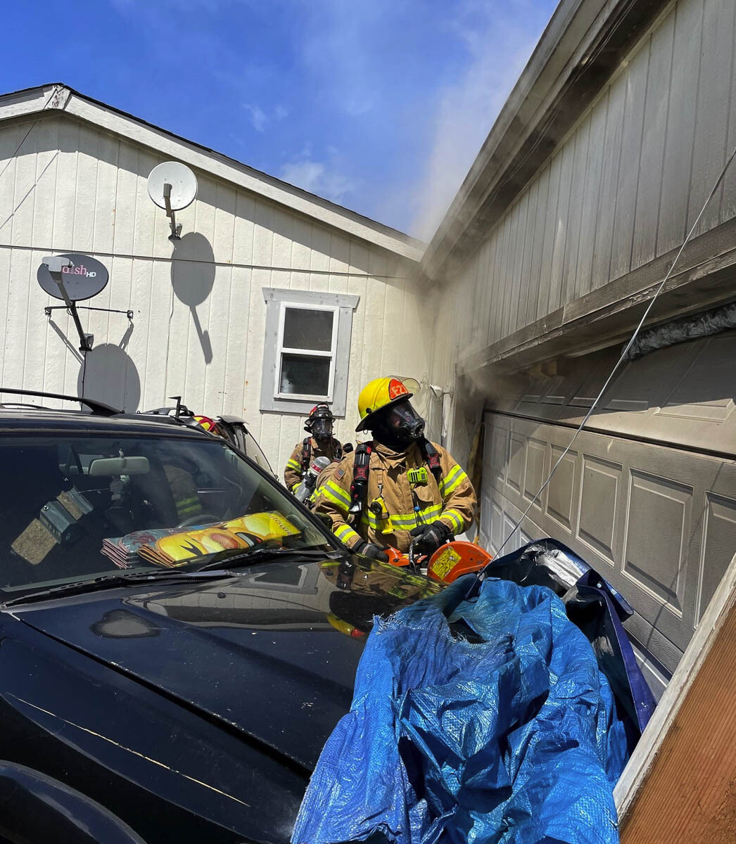 A garage fire in Woodland Tuesday afternoon led to the death of a pet and severe damage to a garage. Photo courtesy of Clark-Cowlitz Fire Rescue