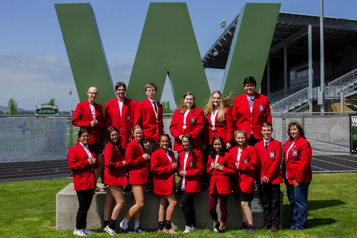 Caitlin Nelson (sophomore) became interested in SkillsUSA after seeing the team in their red blazers (Photo of 2018-2019 SkillsUSA Team taken pre-pandemic). Photo courtesy of Woodland School District