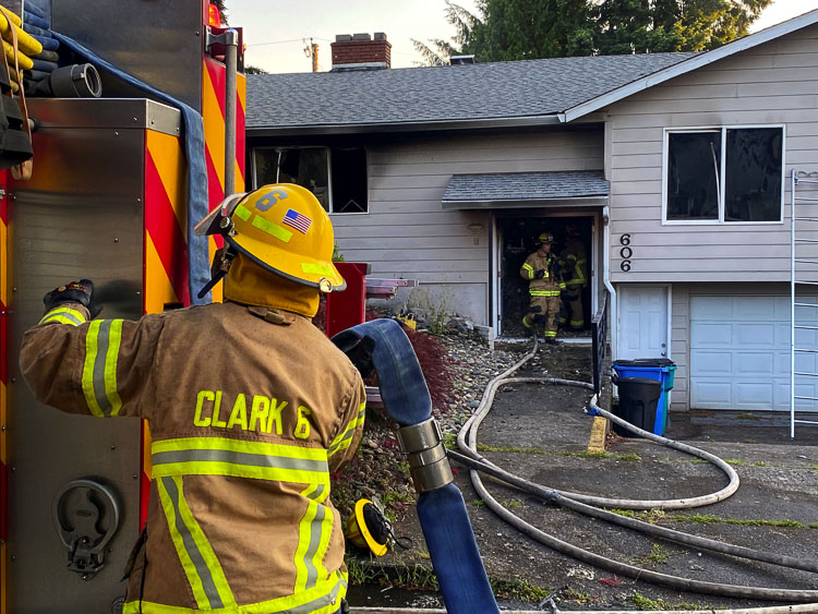 Clark County Fire District 6 Firefighters were able to save one of two dogs Monday morning in a Hazel Dell house fire. Photo courtesy of Clark County Fire District 6