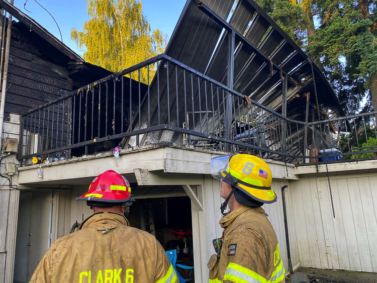 Flames were visible as fire engines arrived at the home on NW 94th Street. Three residents were already out of the house, but two dogs were trapped inside. Clark County Fire District 6
