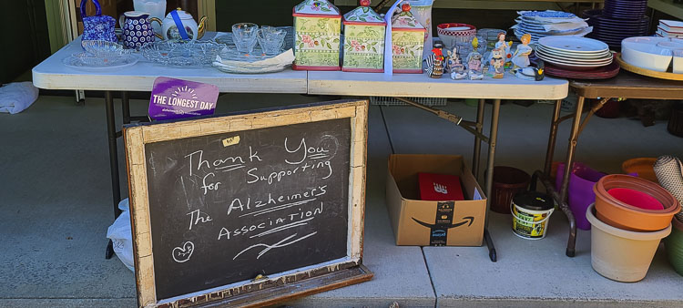All proceeds from Colleen Hoss’ massive yard sale, as well as several yard sales in her Battle Ground neighborhood, will go to the fight against Alzheimer’s. Photo by Paul Valencia