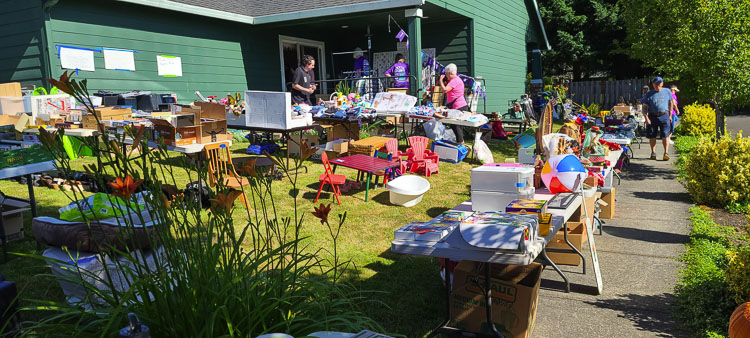 Just part of the yard sale at Colleen Hoss’ house in Battle Ground. More than 40 people donated items for the sale. Photo by Paul Valencia