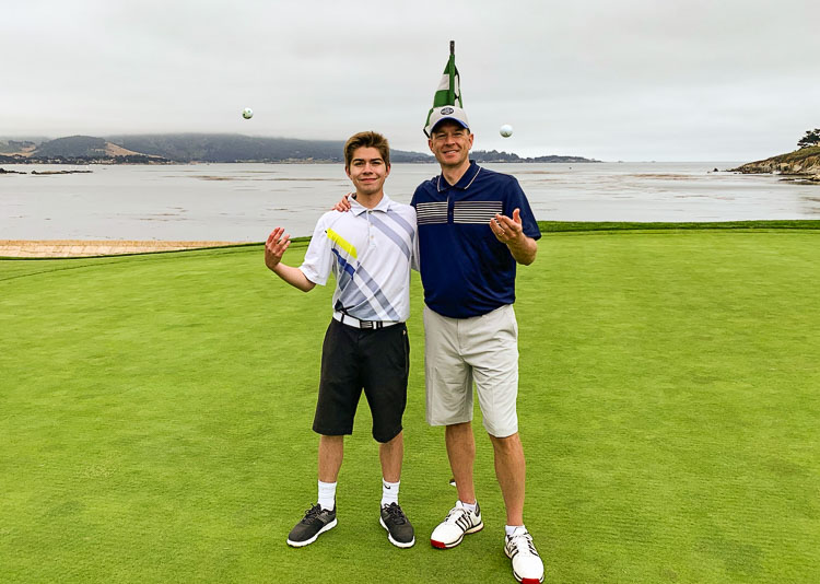 Camden Mills, left, and his father Gary Mills recently played the famous Pebble Beach Golf Links as part of a golf journey that featured four famous courses in three days. It was a graduation gift for Camden, who completed his senior year at Union High School. Gary is a teacher and coach at Union. Photo courtesy Gary Mills