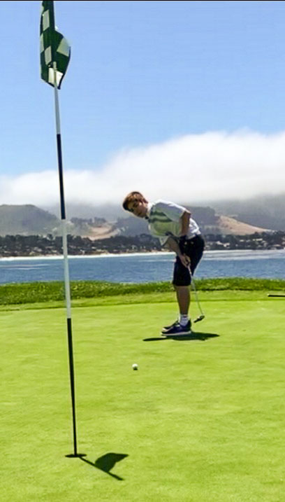 Camden Mills attempts to make birdie at the famous 7th hole at Pebble Beach. Photo courtesy Gary Mills