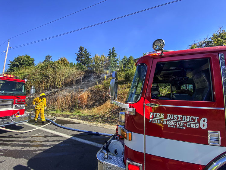 A rapidly burning brush fire threatened at least two homes perched above NW Lakeshore Avenue this morning. Before flames could reach the homes the blaze was knocked down by firefighters with Clark County Fire District 6.