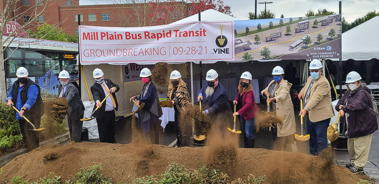 Transportation officials and community leaders teamed up to break ground at the site of a future transit center to be part of the Vine’s expansion to Mill Plain Blvd. in east Vancouver. Photo by Paul Valencia