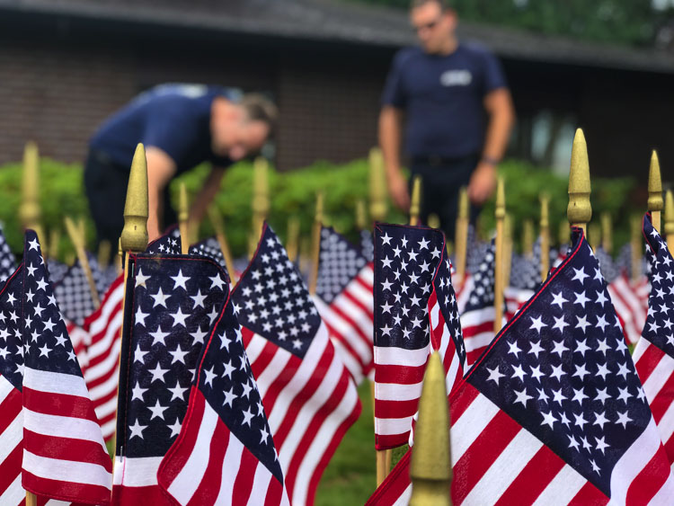 The flags represent the number of fallen New York Firefighters who lost their lives during the 9/11 attack 20 years ago