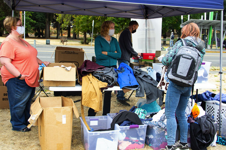 There was a variety of clothing available at the Thrive 2 Survive event. And plenty of volunteers to help those in need find what they were looking for. Photo courtesy Clarissa Sidhom