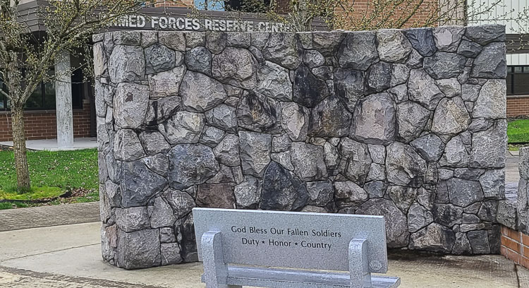 The new bench, provided by the Veterans and First Responders Board of Southwest Washington, will be dedicated in front of the POW monument outside of the Armed Forces Reserve Center. Photo by Paul Valencia