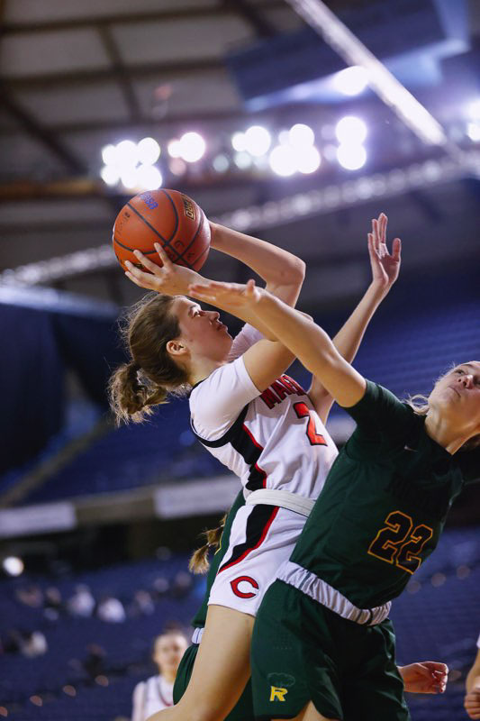 Camas’ Kendall Mairs goes up strong against Richland in Saturday’s fourth-place game at the Tacoma Dome. Mairs finished with nine points and a team-high 15 rebounds. Photo by Heather Tianen