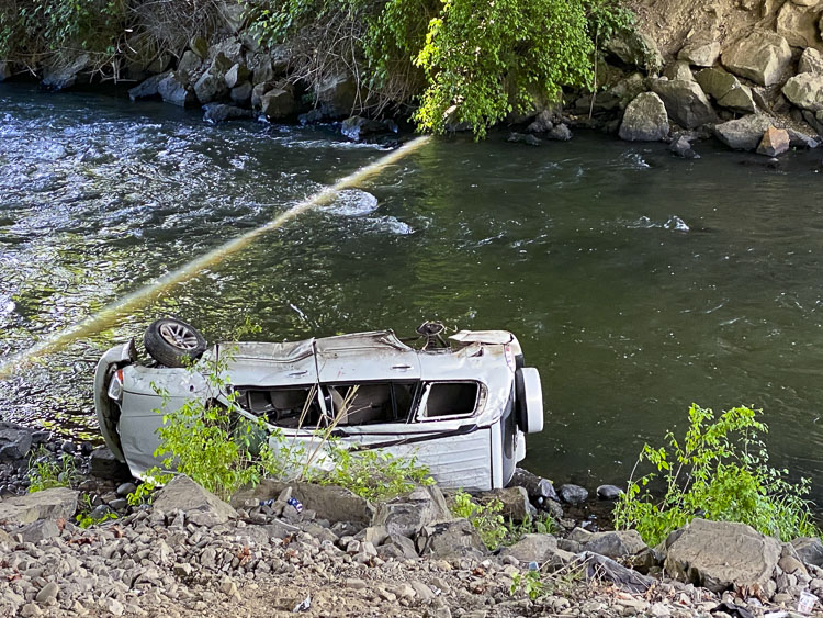 Shortly after 1 p.m. this afternoon a small SUV carrying ten teenagers spun off the road and rolled multiple times, coming to rest on the shore of Salmon Creek.