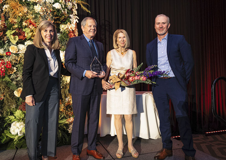 Ron and Terry Prill (center) accept the 2022 Philanthropists of the Year Award from Janie Spurgeon, chief development officer of the Community Foundation, and Sean Gregory, chief executive of PeaceHealth's Columbia Network. Photo courtesy of Tom Cook Photography