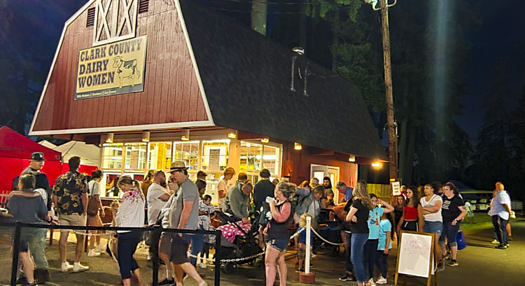 The lines were not long just for the rides. The food court was packed all Sunday night and so, too, was the line at the Clark County Dairy Women barn. Milkshakes and ice cream please. Photo by Paul Valencia