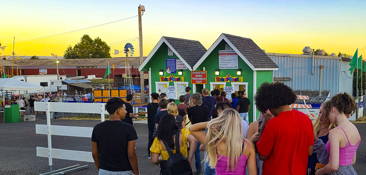 There was a line to buy tickets to get into the fair at 8 p.m. on Sunday. The Clark County Fair officially closed at 10 p.m., but folks still did not mind paying to experience the final hours. Photo by Paul Valencia