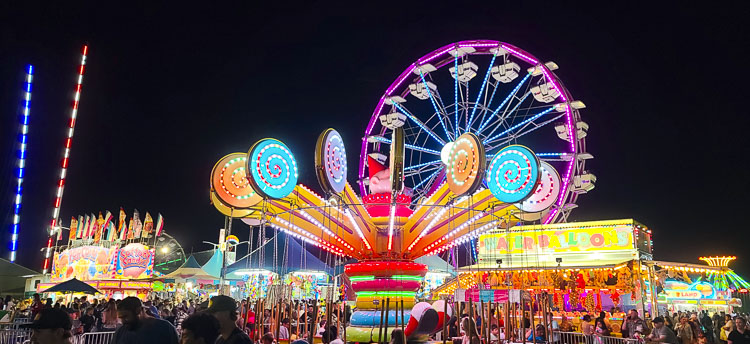 The carnival at the Clark County Fair remained open long after the official closing time. There was a special vibe, fairgoers said. Photo by Paul Valencia