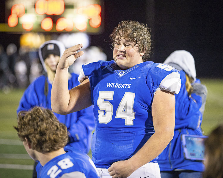 Clayton Muffett, a senior from La Center, addresses the team after Cashmere beat the Wildcats on Friday night in the Class 1A state football playoffs. Muffett and the other La Center seniors have left a lasting legacy, according to coach John Lambert. Photo by Mike Schultz