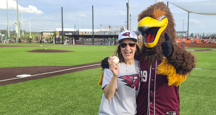 Rally the Raptor hangs out with Ridgefield Mayor Jennifer Lindsay during a Ridgefield Raptors game last year. The Raptors got a strong response to a survey sent to their ticket holders, and they are making changes, preparing for the 2023 season. Photo by Paul Valencia
