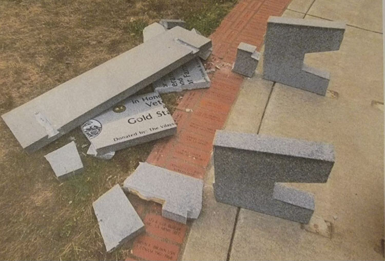 A vandal destroyed the first granite bench in honor of Gold Star families outside the Armed Forces Reserve Center. A new bench was made, and the Veterans and First Responders Board of SW WA rededicated it on Saturday. Photo courtesy Darvin Zimmerman