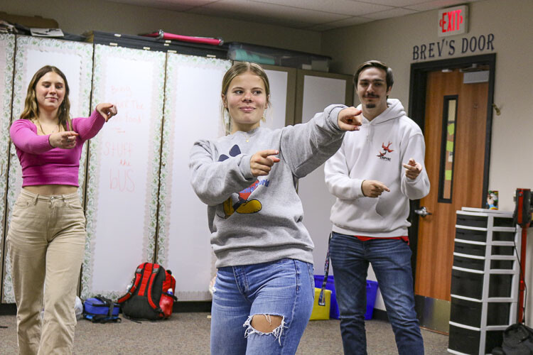 Left to Right: Sam Jackson, Natalie Schoenborn, and Zach Bobeck practice their performance for the ASL Showcase. Photo courtesy Washougal School District