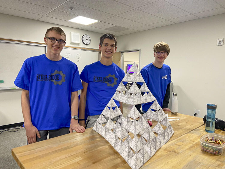 Members of the Steel Ridge Robotics team show off a successful paper structure build. Photo courtesy Ridgefield School District