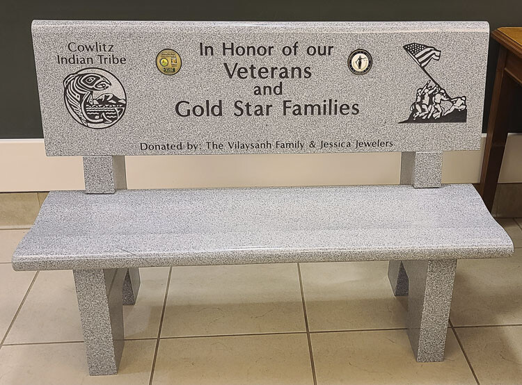A new bench to honor veterans and Gold Star families was dedicated Saturday at the Armed Forces Reserve Center in Vancouver. The old bench, which was located outside the center’s main doors, was destroyed by a vandal late last year. Photo by Paul Valencia