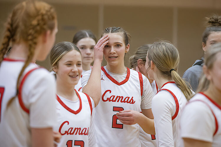 Kendal Mairs feels for the knot on her forehead — she called it a basketball — after her incredible performance Friday night. Mairs was the defensive MVP of the game, helping Camas defeat Bellarmine. Mairs also hit her head on the gym wall in the final minutes of the game, creating quite the bump. Photo by Mike Schultz