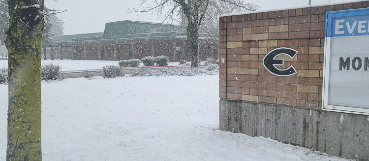 Evergreen High School was still in session Wednesday. The snow did not start sticking until after buses were en route to pick up students in the morning. This photo was taken at 11 a.m. Photo by Paul Valencia