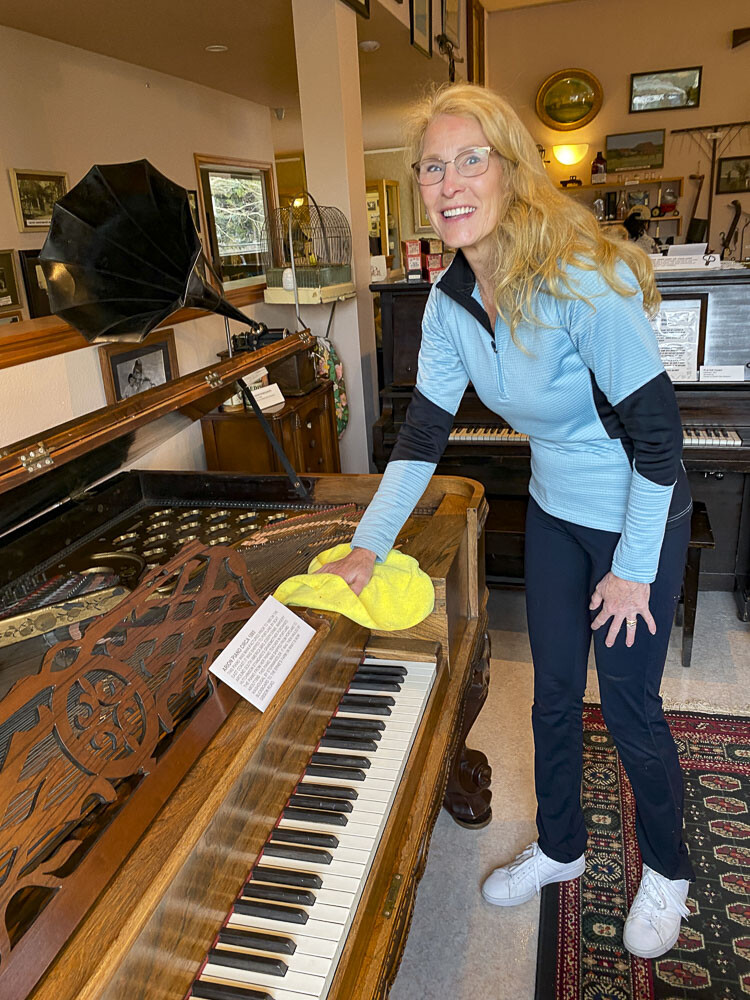 Lee Gilronan cleans in preparation for the reopening of the Two Rivers Heritage Museum in Washougal. Photo courtesy Camas Washougal Historical Society