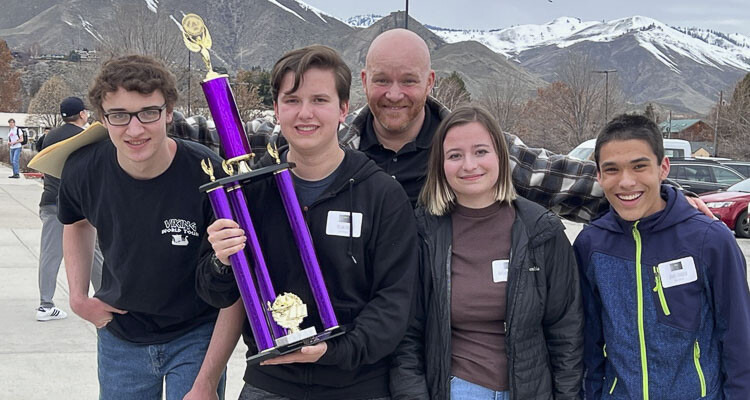 Ridgefield High School Knowledge Bowl team members (from L to R) are Stuart Swingruber, Adam Ford, coach David Jacobson, Emi Newell, and James Haddix. Photo courtesy Ridgefield School District