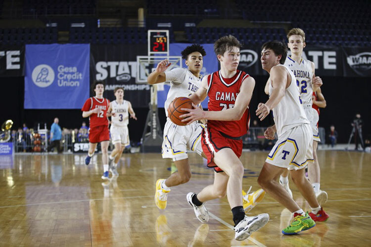 Camas’ Theo McMillan drives toward the hoop in the Tacoma Dome on Wednesday. McMillan scored a team-high 24 points, helping the Papermakers advance to the Class 4A state quarterfinals. Photo courtesy Heather Tianen