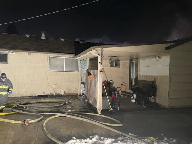 Two occupants of a Vancouver home were able to evacuate after a fire consumed their residence Wednesday morning.