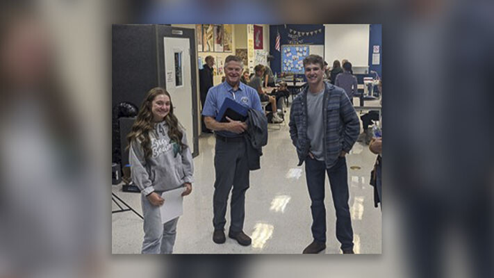 Dave Olson (center) is shown here with Hockinson students in the Fall of 2022. Photo courtesy Hockinson School District